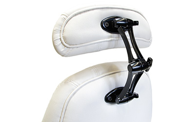 White chair with an adjustable Lifeform Latitude Headrest attached to the backrest.