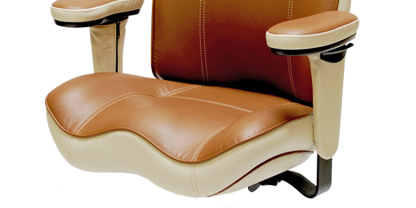 Two‑tone leather office chair seat with a deep contoured cushioning and padded armrests.