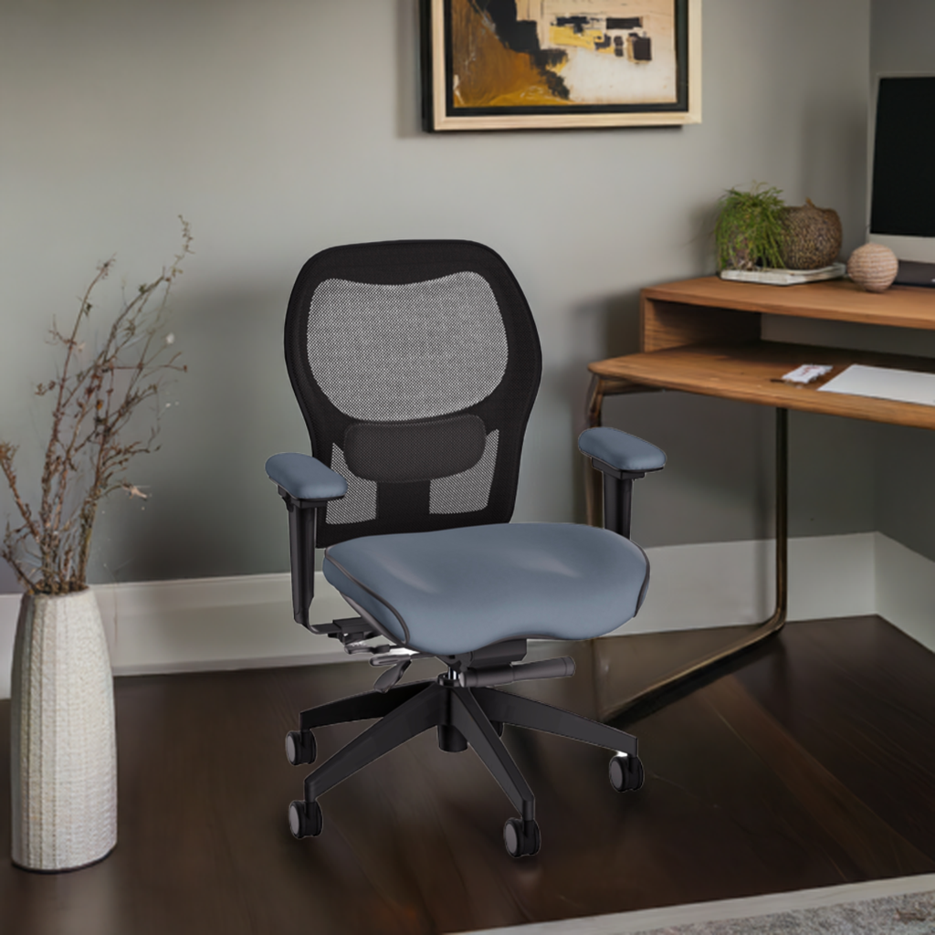 Ergonomic office chair with black mesh back and grey fabric seat positioned at a wooden desk in a modern home office setting.