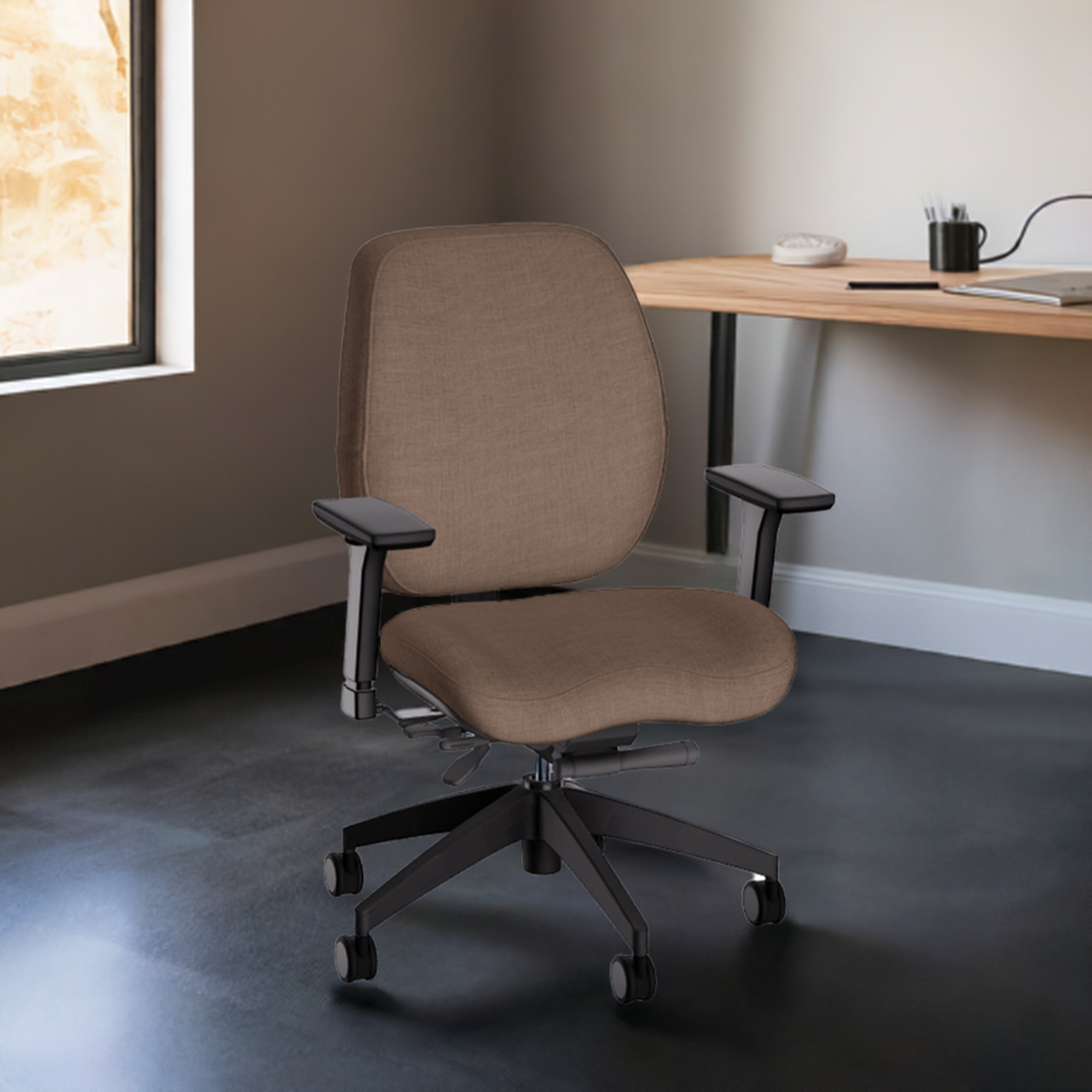 Brown ergonomic office chair with adjustable black armrests and wheeled base, positioned in front of a wooden desk near a window in a minimalist workspace.