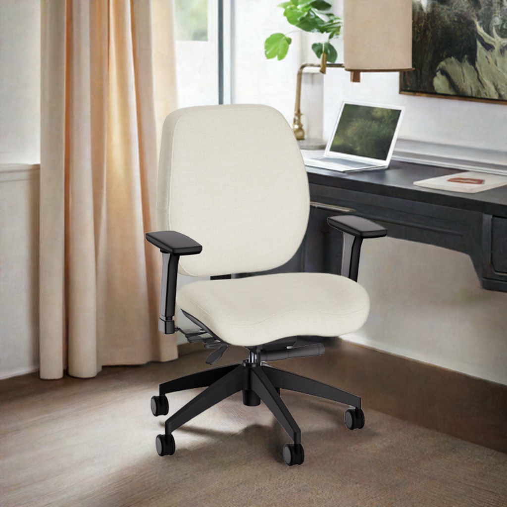 Cream-coloured ergonomic office chair with black armrests and wheeled base positioned at a dark desk in a modern home office with natural light.